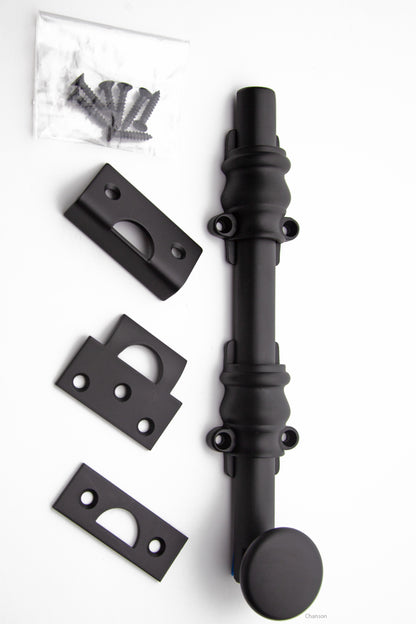 8 inch Solid Brass Surface Bolt in flat or matte black finish US19 with Ornate, Ornamental, or Colonial style guides with finish matching screws along with angle, mortise, and surface strike.  All 3 strikes included.