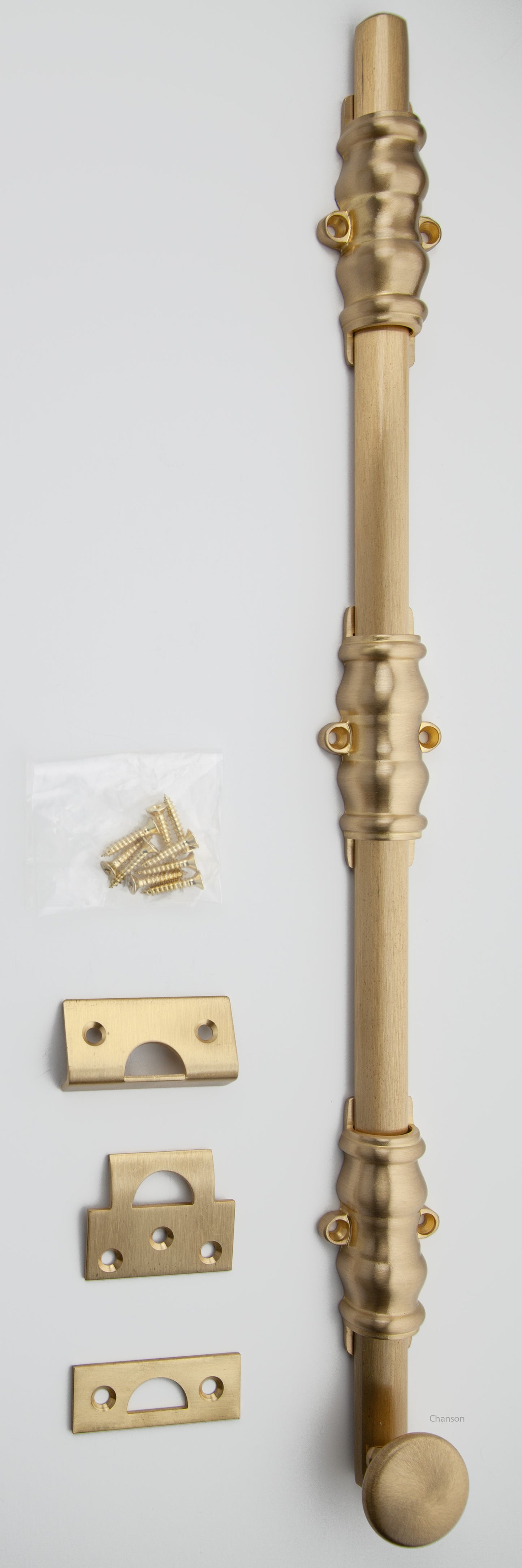 Solid Brass Surface Bolt with satin brass finish US4 and Ornate, Ornamental, or Colonial style guides with finish matching screws along with angle, mortise, and surface strike.  All 3 strikes included.