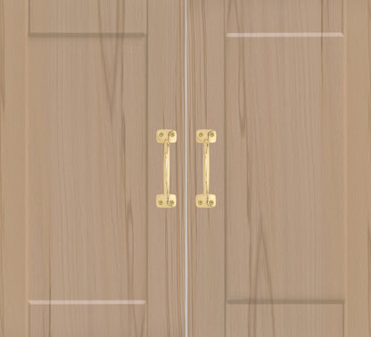 Chanson Hardware larger sized 4 inch center to center pulls shown on cabinet door with unlacquered brass finish