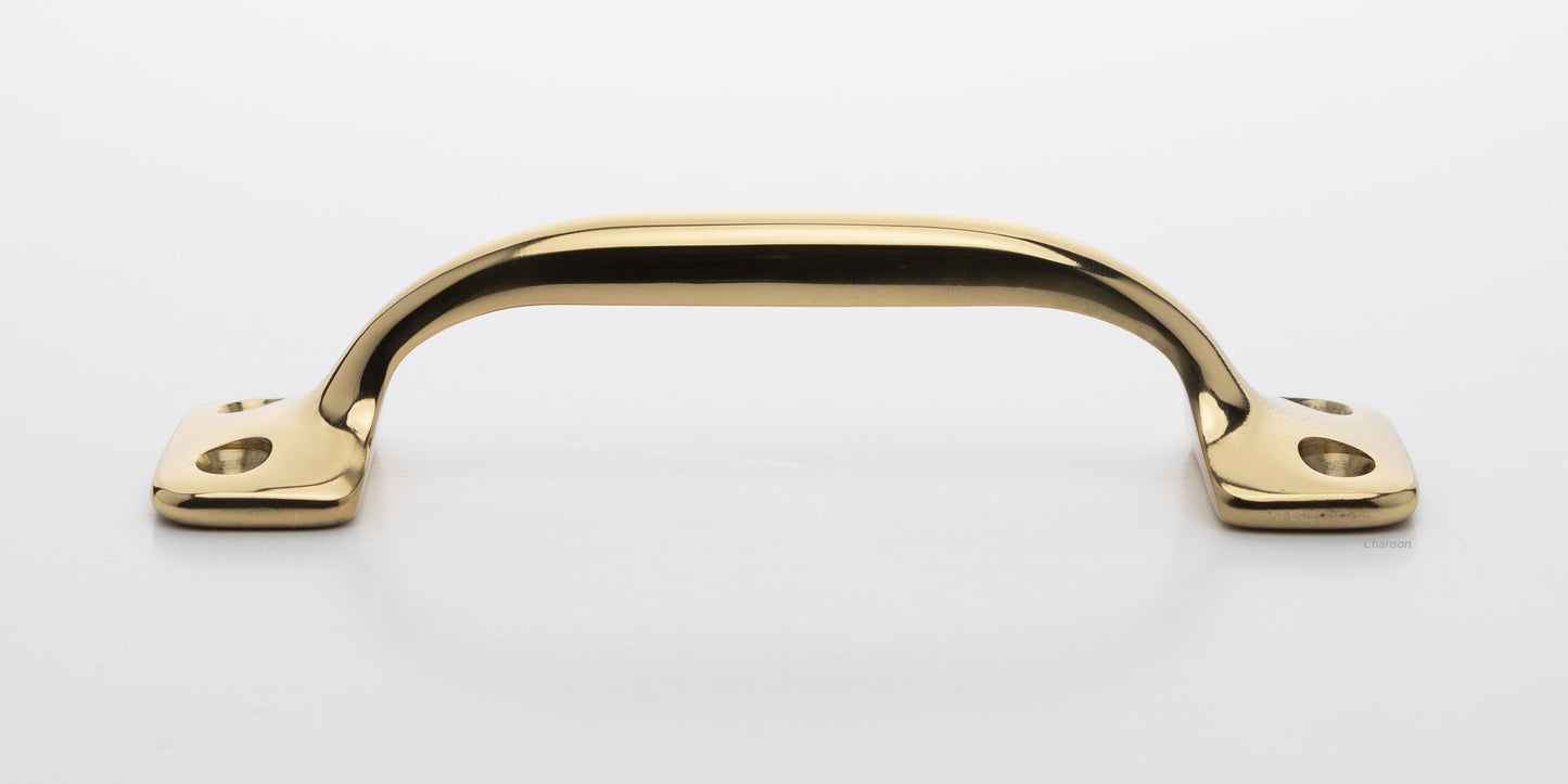 Side view of 4 inch solid brass sash window bar lift or utility pull handle shows arch shape and unlacquered brass US3NL finish