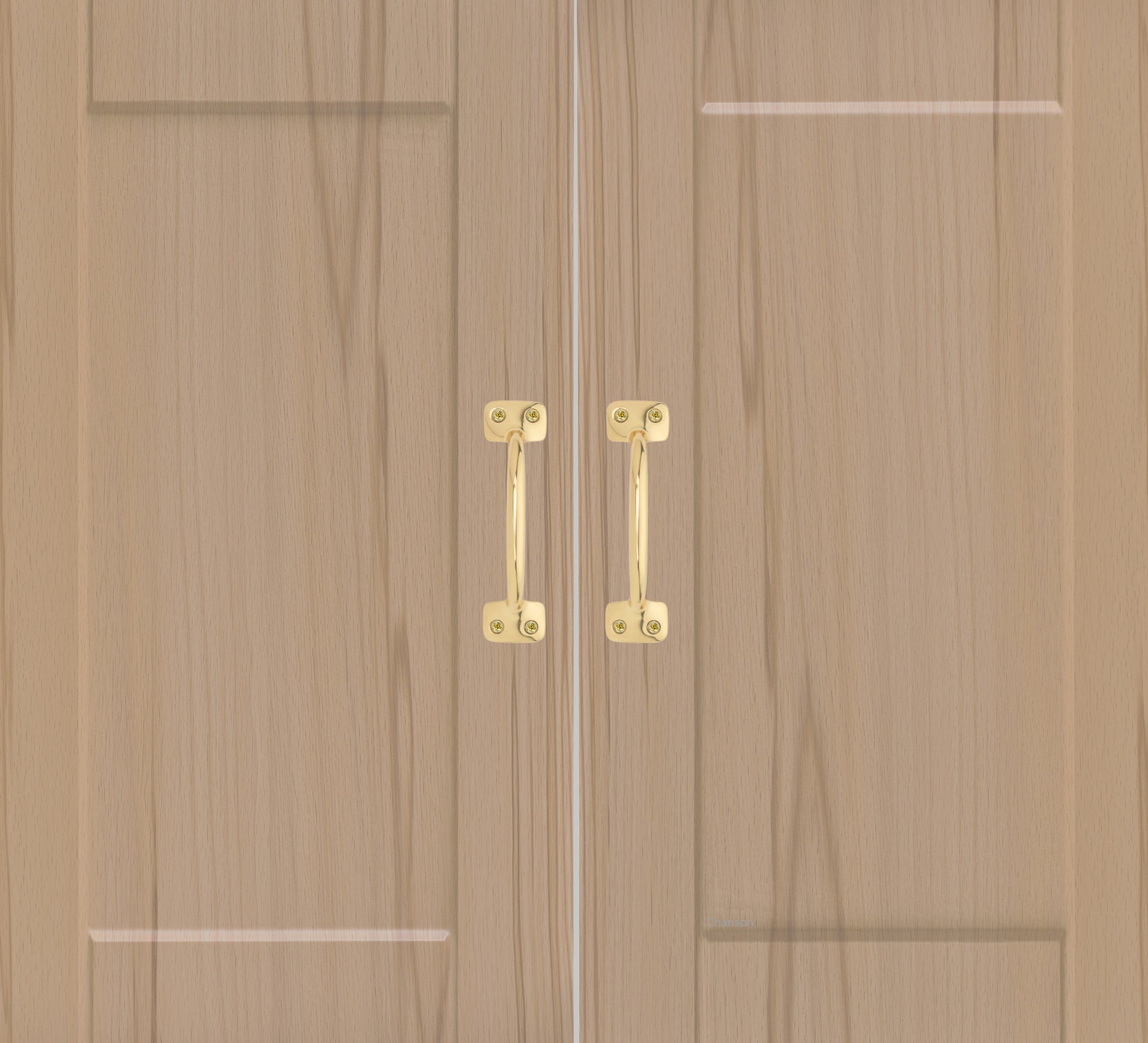 Chanson Hardware larger sized 4 inch center to center pulls shown on cabinet door with polished brass finish