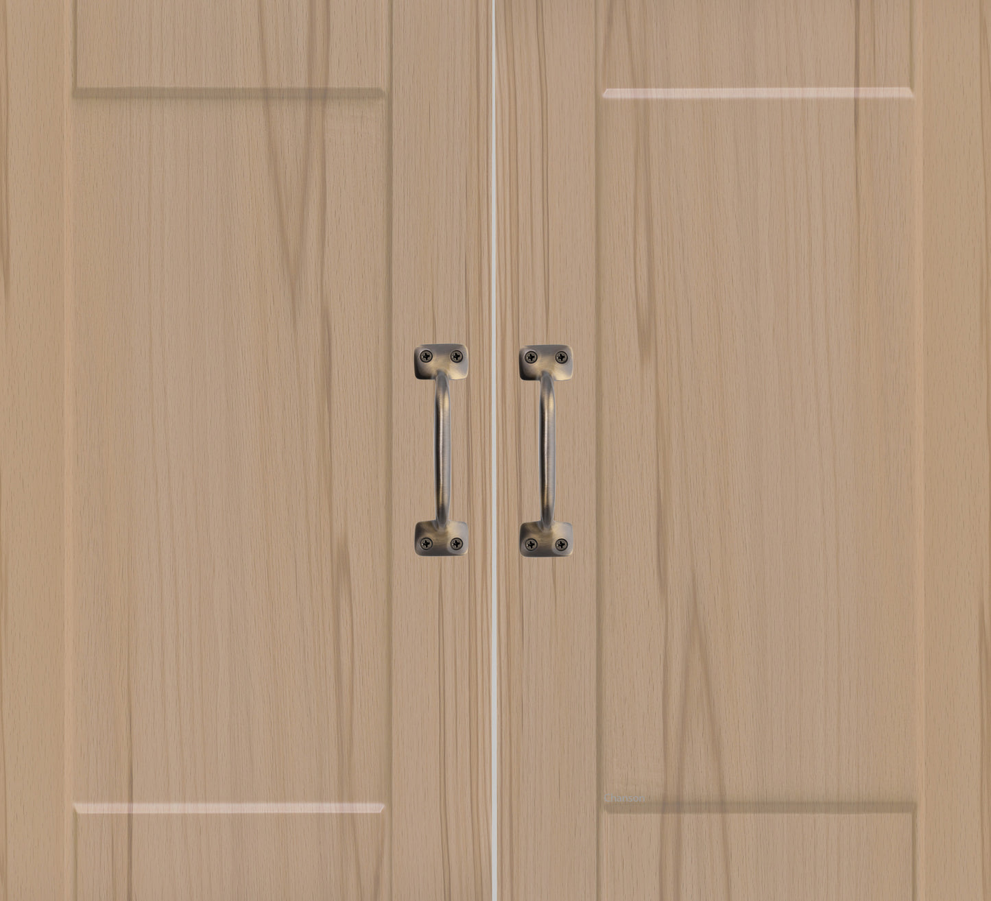 Chanson Hardware larger sized 4 inch center to center pulls shown on cabinet door with antique brass finish