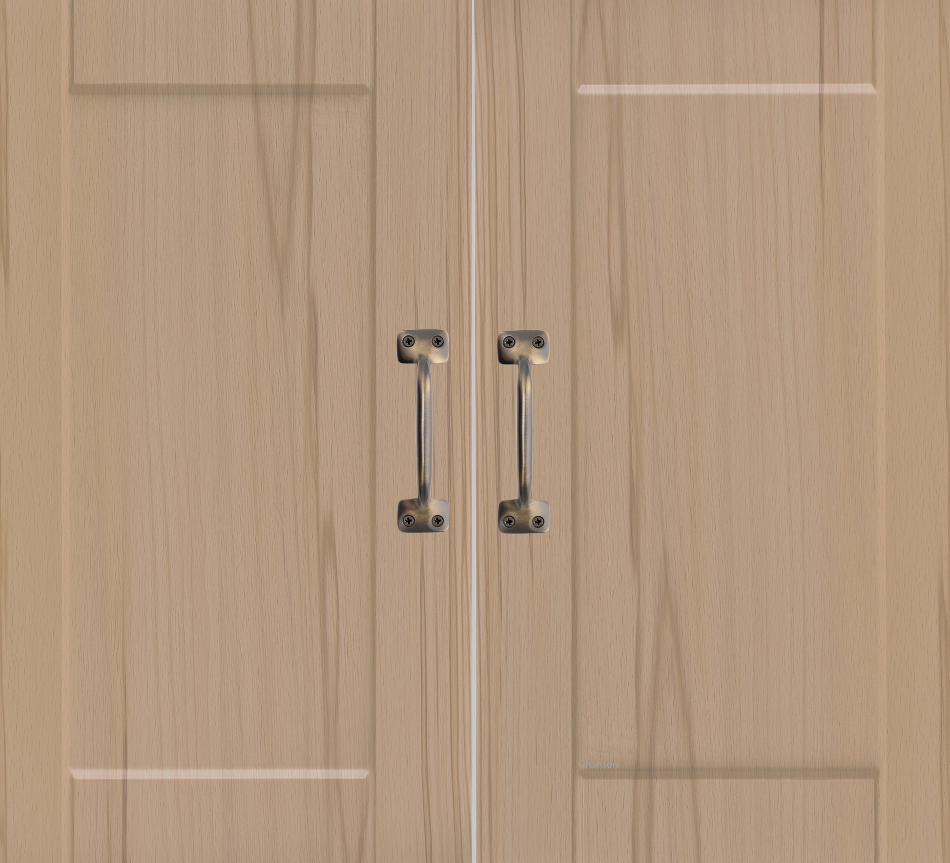 Chanson Hardware larger sized 4 inch center to center pulls shown on cabinet door with antique brass finish