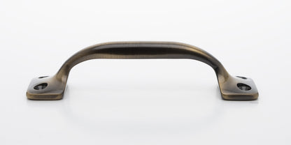 Side view of 4 inch solid brass sash window bar lift or utility pull handle shows arch shape and antique brass US5 finish