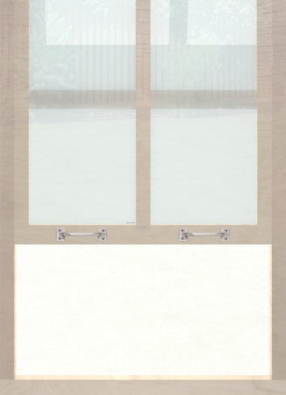 A wooden sash window with a pair of chanson hardware solid brass bar type sash lifts in satin nickel finish