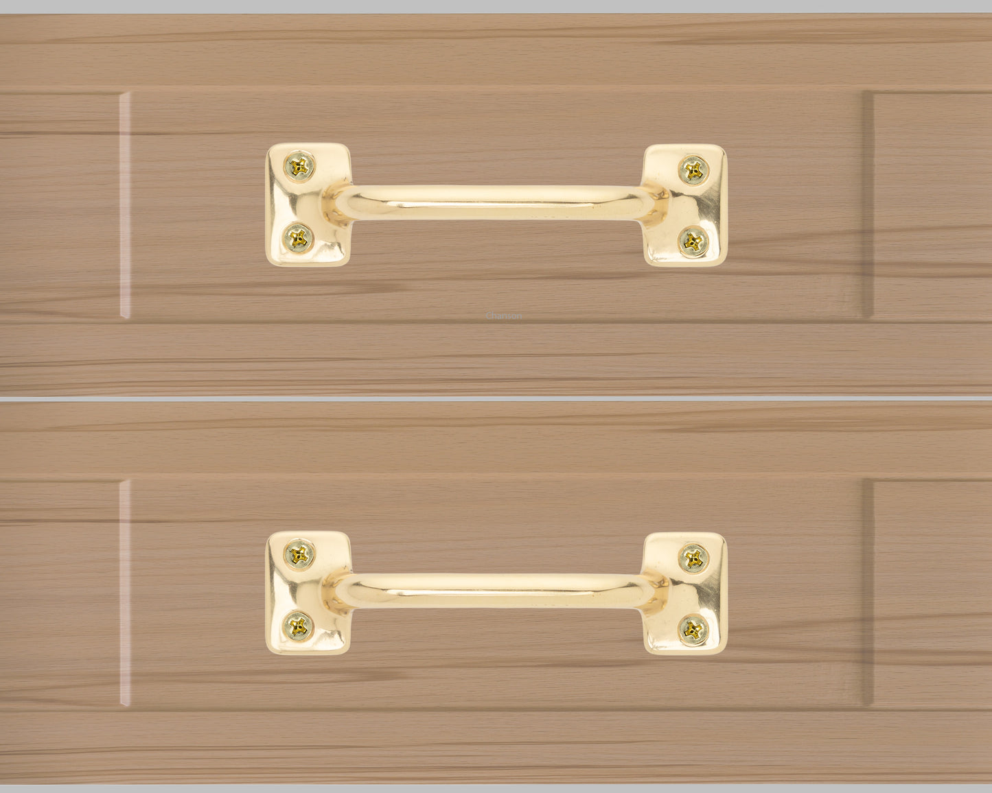 Chanson hardware solid brass drawer pull shown on drawer face with polished brass finish