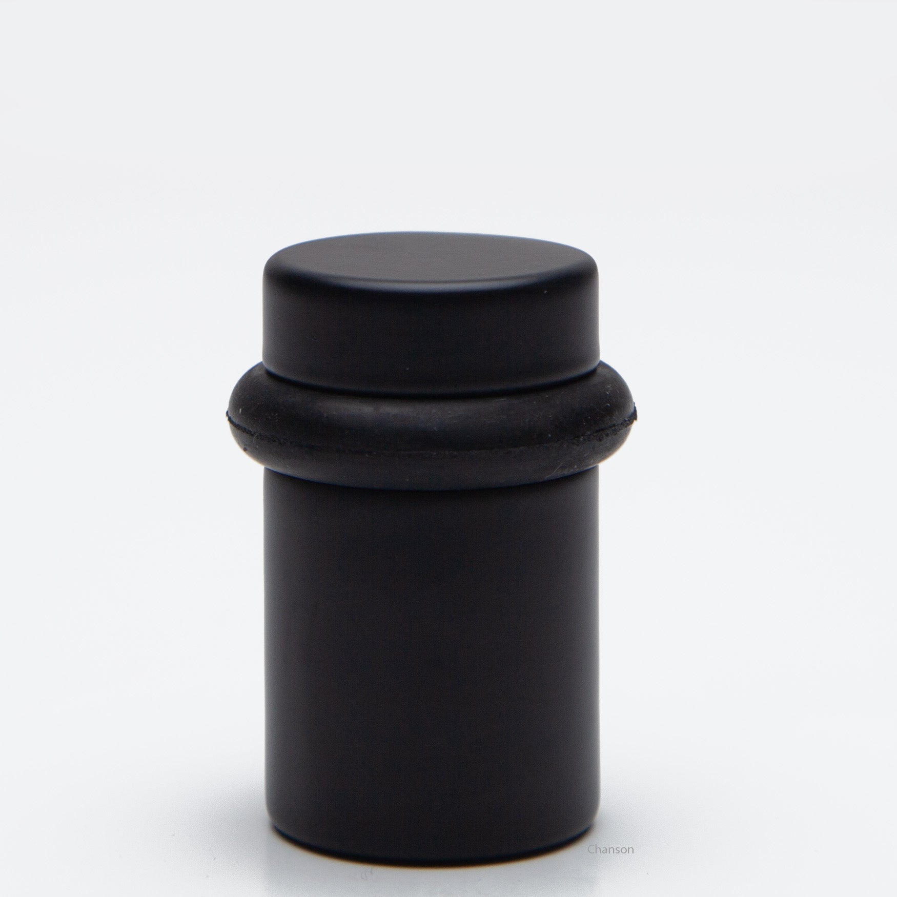 2 inch tall solid brass cylindrical shaped simple universal doorstop or floor bumper in flat or matte black finish US19
