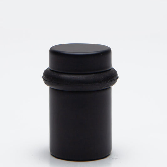 2 inch tall solid brass cylindrical shaped simple universal doorstop or floor bumper in flat or matte black finish US19