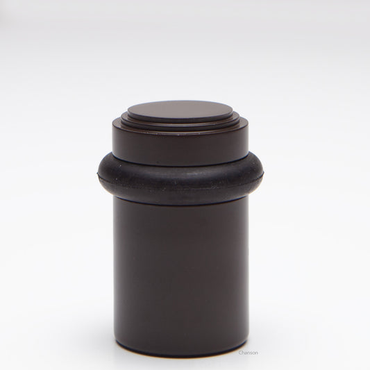 2 inch solid brass decorative floor doorstop or bumper with stepped top and cylindrical top in oil rubbed bronze US10B finish. Art Deco inspired