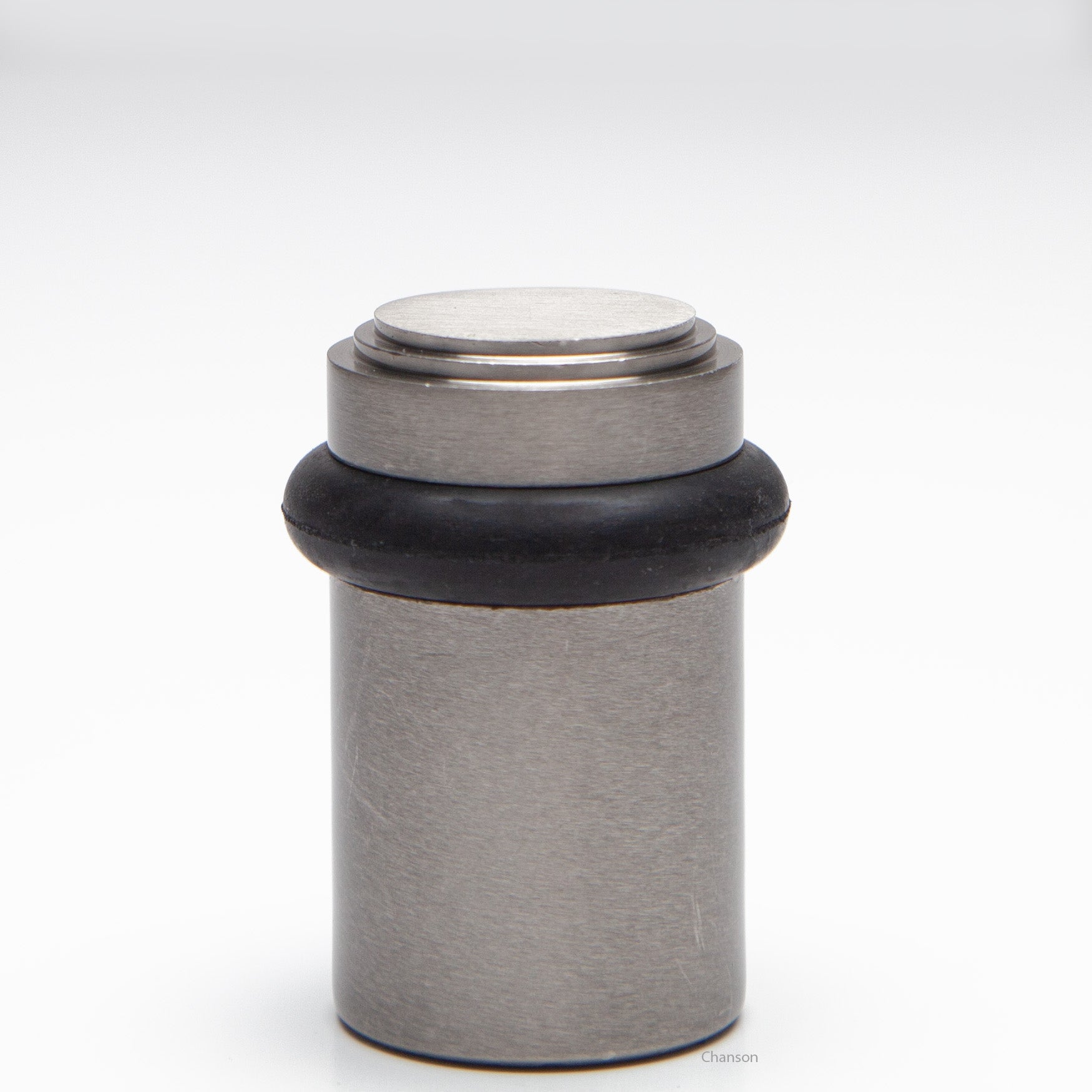 2 inch solid brass decorative floor doorstop or bumper with stepped top and cylindrical top in satin or brushed nickel US15 finish. Art Deco inspired