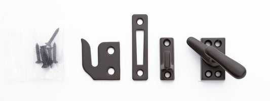 Solid brass casement fastener set that includes surface, rim, and mortise strike and finish matching screws. Finish is oil rubbed bronze US10B