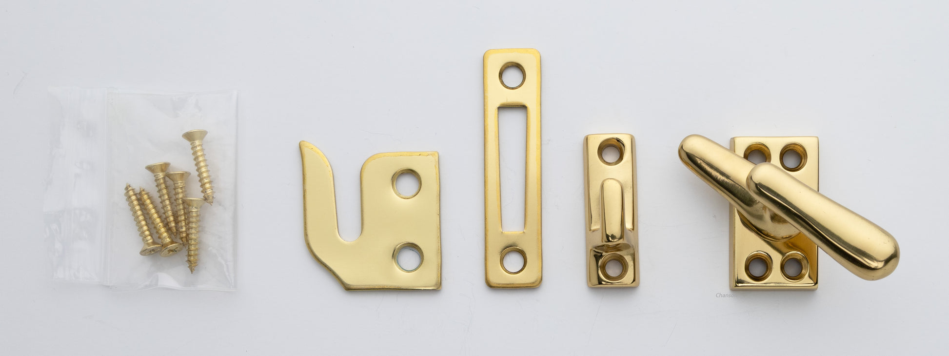 Solid brass casement fastener set that includes surface, rim, and mortise strike and finish matching screws. Finish is polished brass finish US3