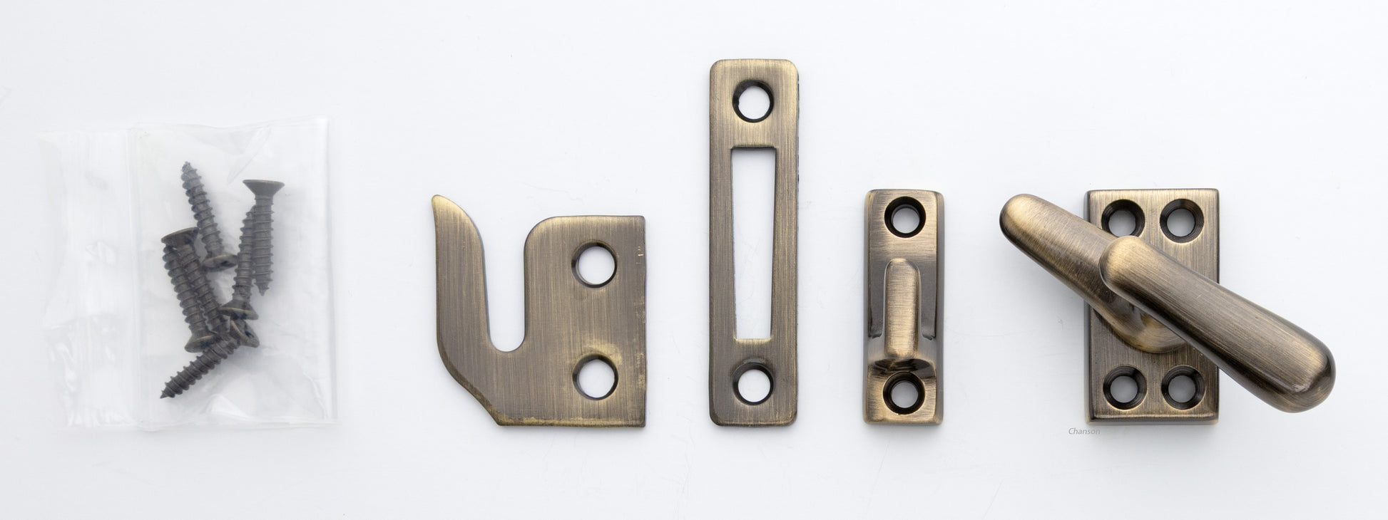 Solid brass casement fastener set that includes surface, rim, and mortise strike and finish matching screws. Finish is antique brass US5