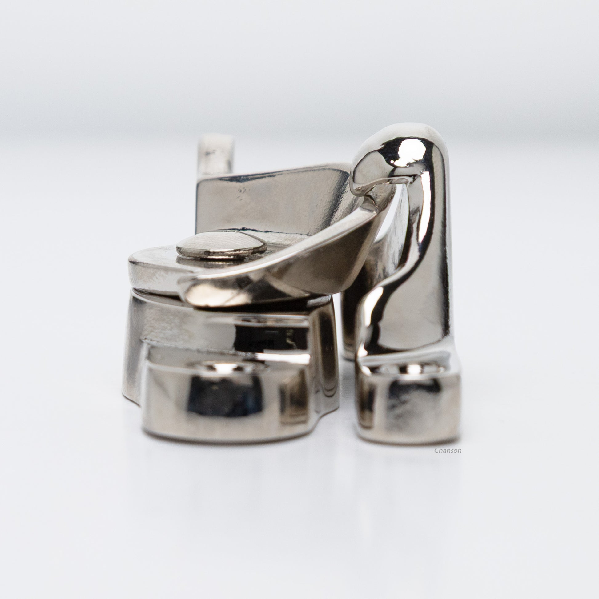 Side view of  large size solid brass sash catch, which shows latch engaging with hook strike or keeper. finish is polished nickel US14