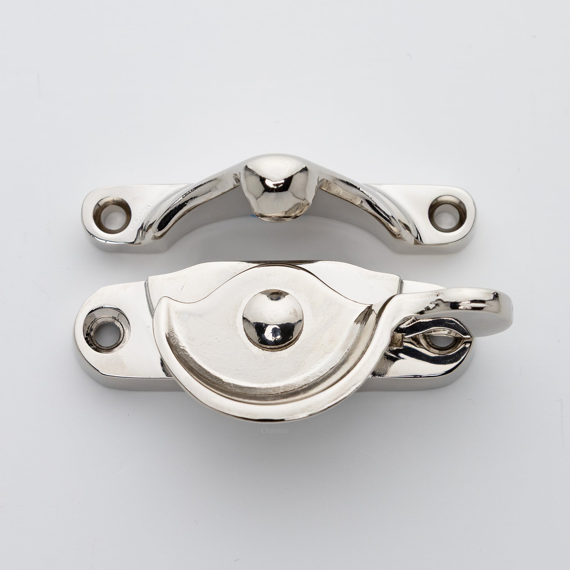 Classic style  large solid brass sash catch shown with lock turned open. Showcases hook shaped keeper and crescent shaped latch in polished nickel US14 finish