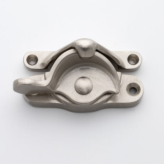Classic or traditional large solid brass sash catch or sash window lock with hook style keeper and crescent shape in satin or brushed nickel US15 finish