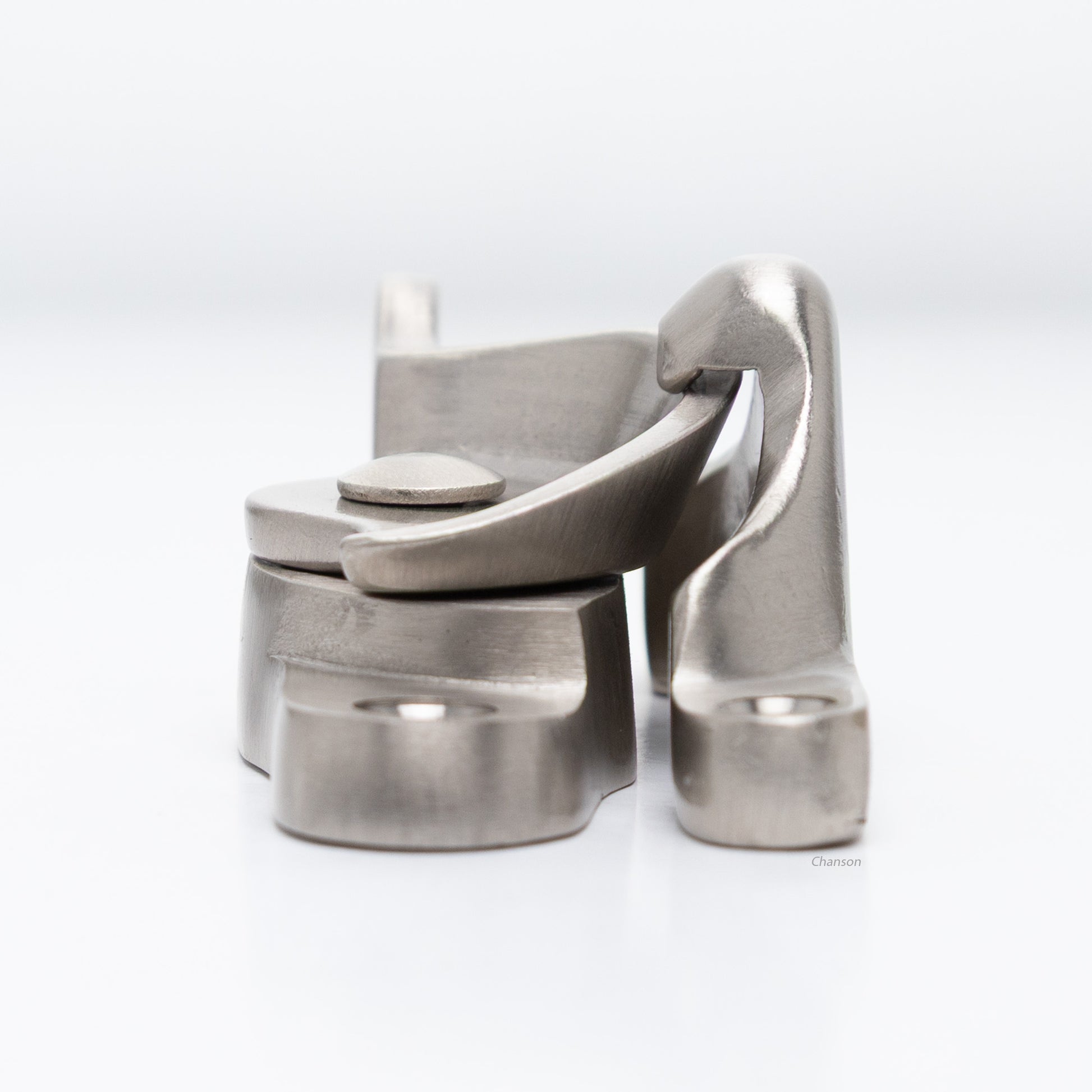 Side view of  large size solid brass sash catch, which shows latch engaging with hook strike or keeper. finish is satin or brushed nickel US15