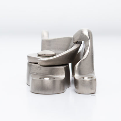 Side view of  large size solid brass sash catch, which shows latch engaging with hook strike or keeper. finish is satin or brushed nickel US15