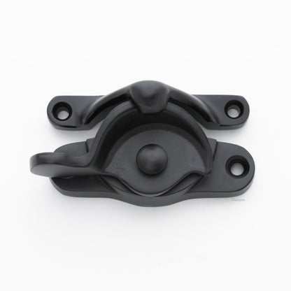 Classic or traditional large solid brass sash catch or sash window lock with hook style keeper and crescent shape in flat or matte black US19 finish