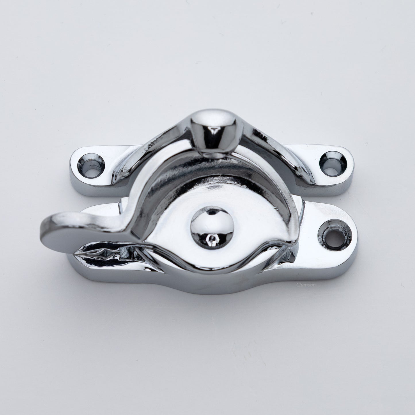 Classic or traditional large solid brass sash catch or sash window lock with hook style keeper and crescent shape in polished chrome US26 finish