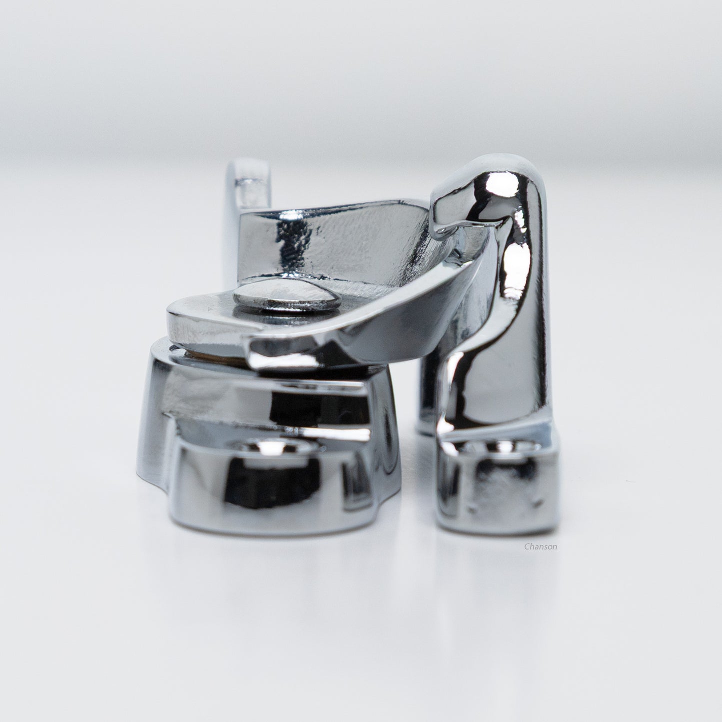 Side view of  large size solid brass sash catch, which shows latch engaging with hook strike or keeper. finish is polished chrome US26