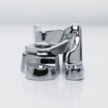 Side view of  large size solid brass sash catch, which shows latch engaging with hook strike or keeper. finish is polished chrome US26