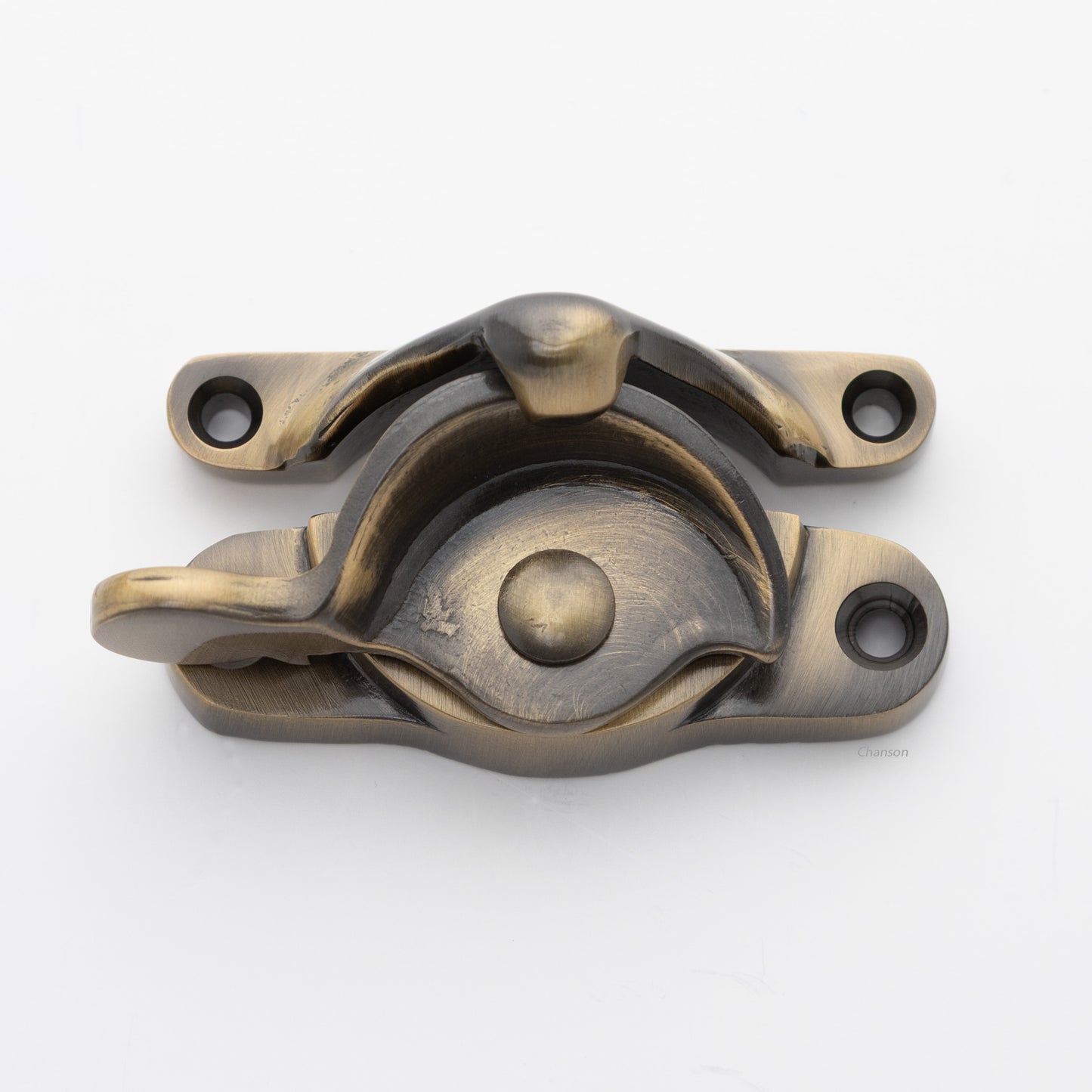 Classic or traditional large solid brass sash catch or sash window lock with hook style keeper and crescent shape in antique brass US5 finish