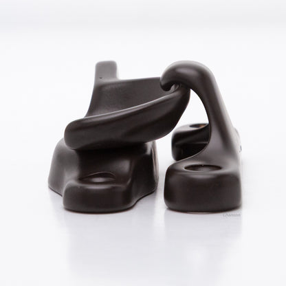 Side view of solid brass sash catch, which shows latch engaging with hook strike or keeper. finish is oil rubbed bronze US10B