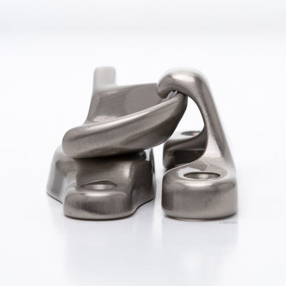 Side view of solid brass sash catch, which shows latch engaging with hook strike or keeper. finish is satin or brushed nickel US15