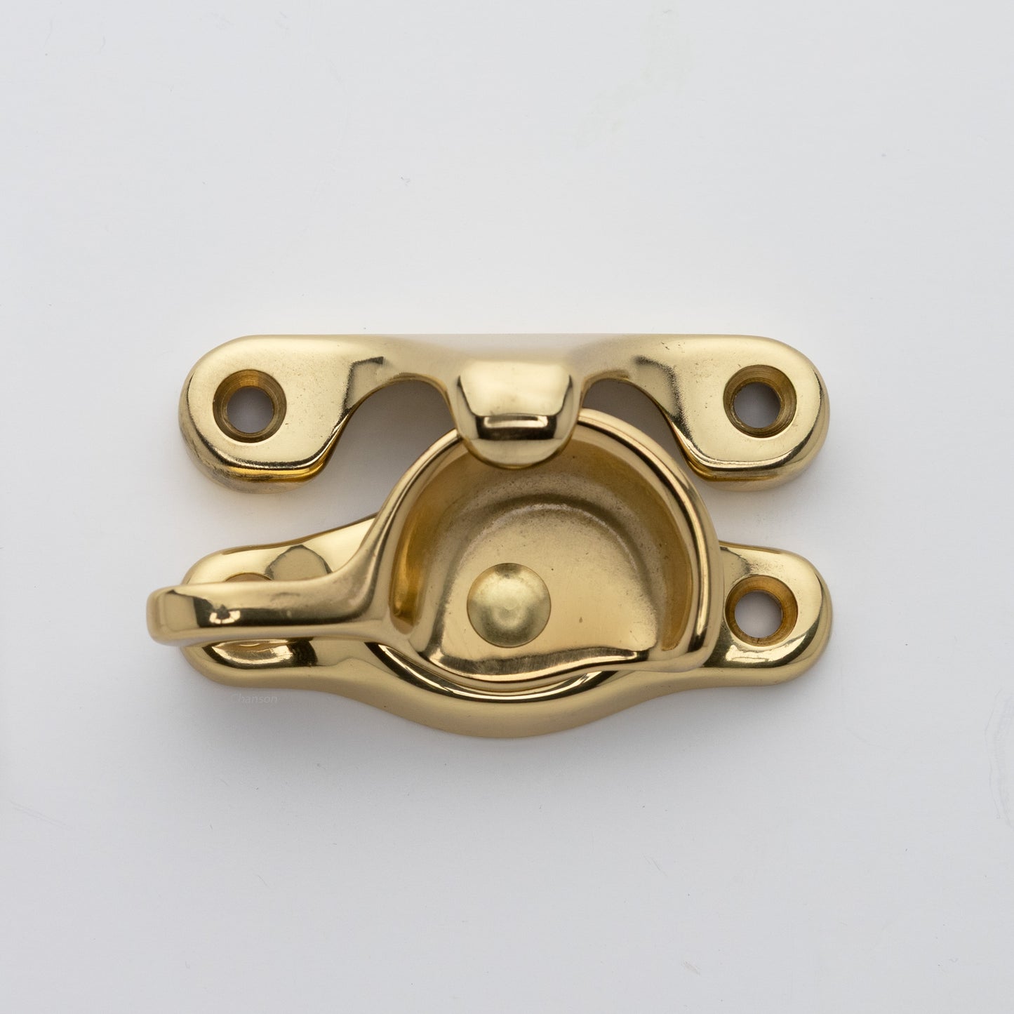 Classic or traditional solid brass sash catch or sash window lock with hook style keeper and crescent shape in polished brass US3 finish