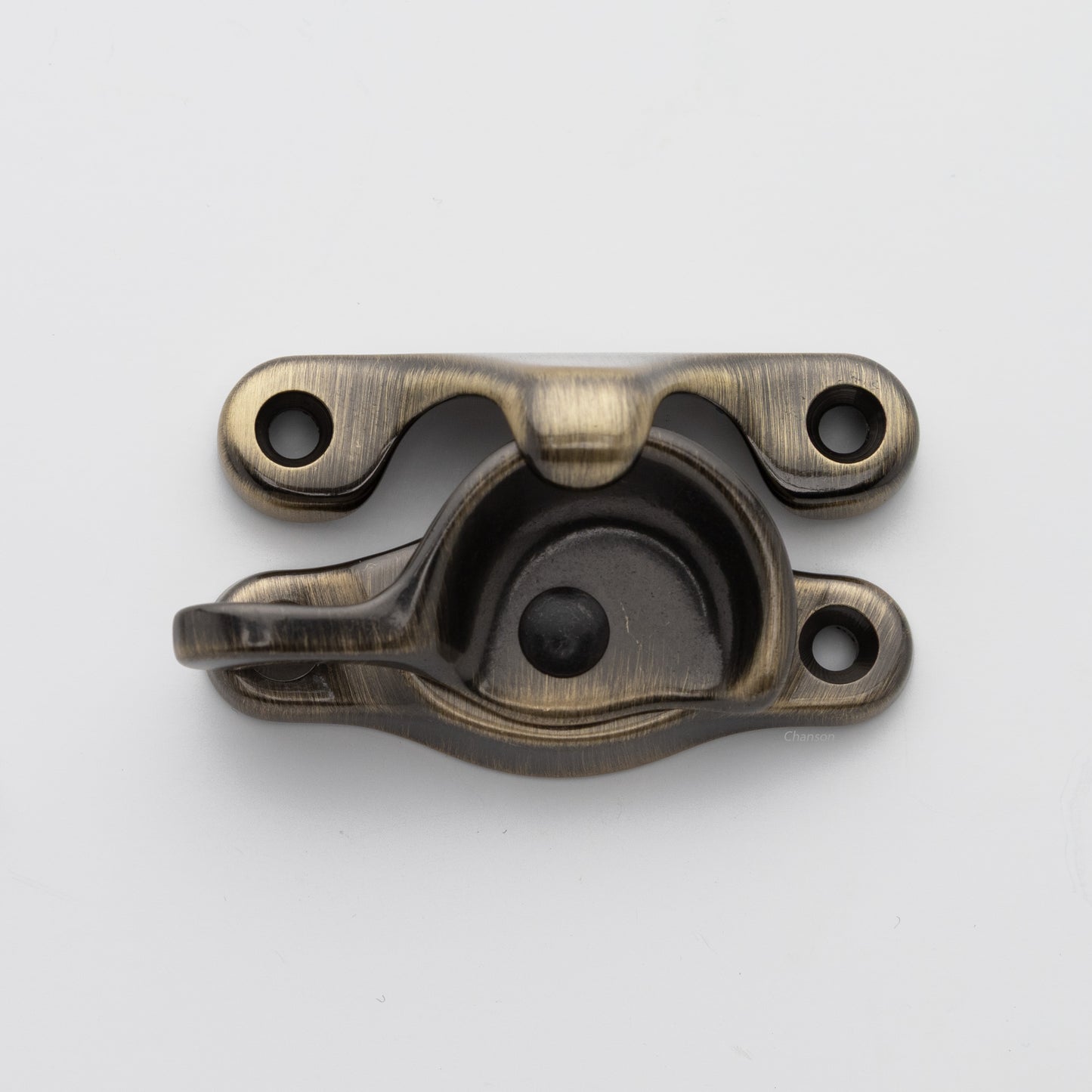 Classic or traditional solid brass sash catch or sash window lock with hook style keeper and crescent shape in antique brass US5 finish