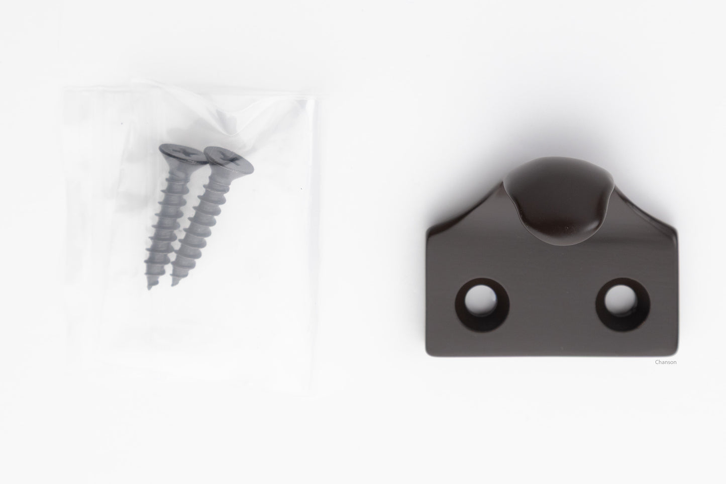A classic traditional simple solid brass hook type sash window lift in oil rubbed bronze US10B finish, along with finish matching screws