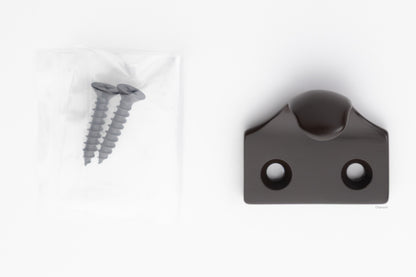 A classic traditional simple solid brass hook type sash window lift in oil rubbed bronze US10B finish, along with finish matching screws