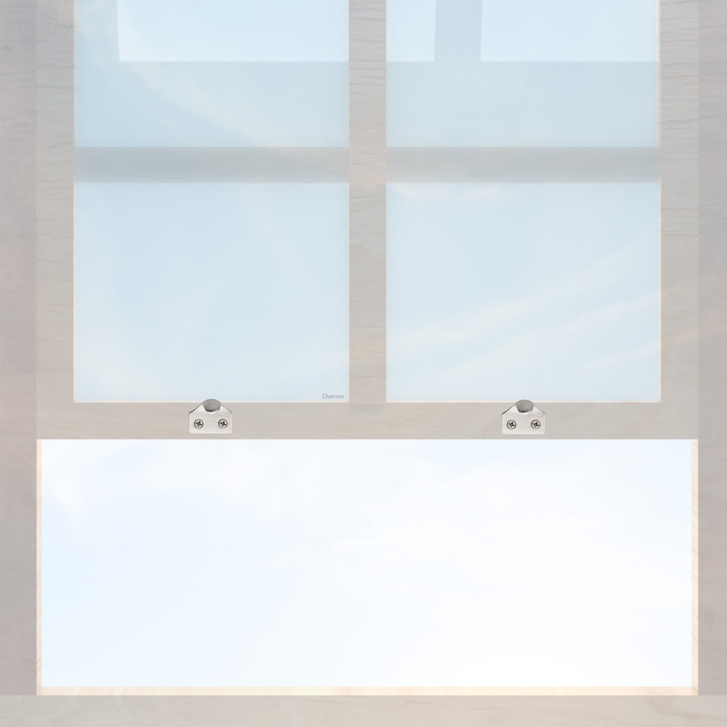 A wooden sash window with a pair of chanson hardware solid brass sash lifts that have a hook type design and a satin nickel finish