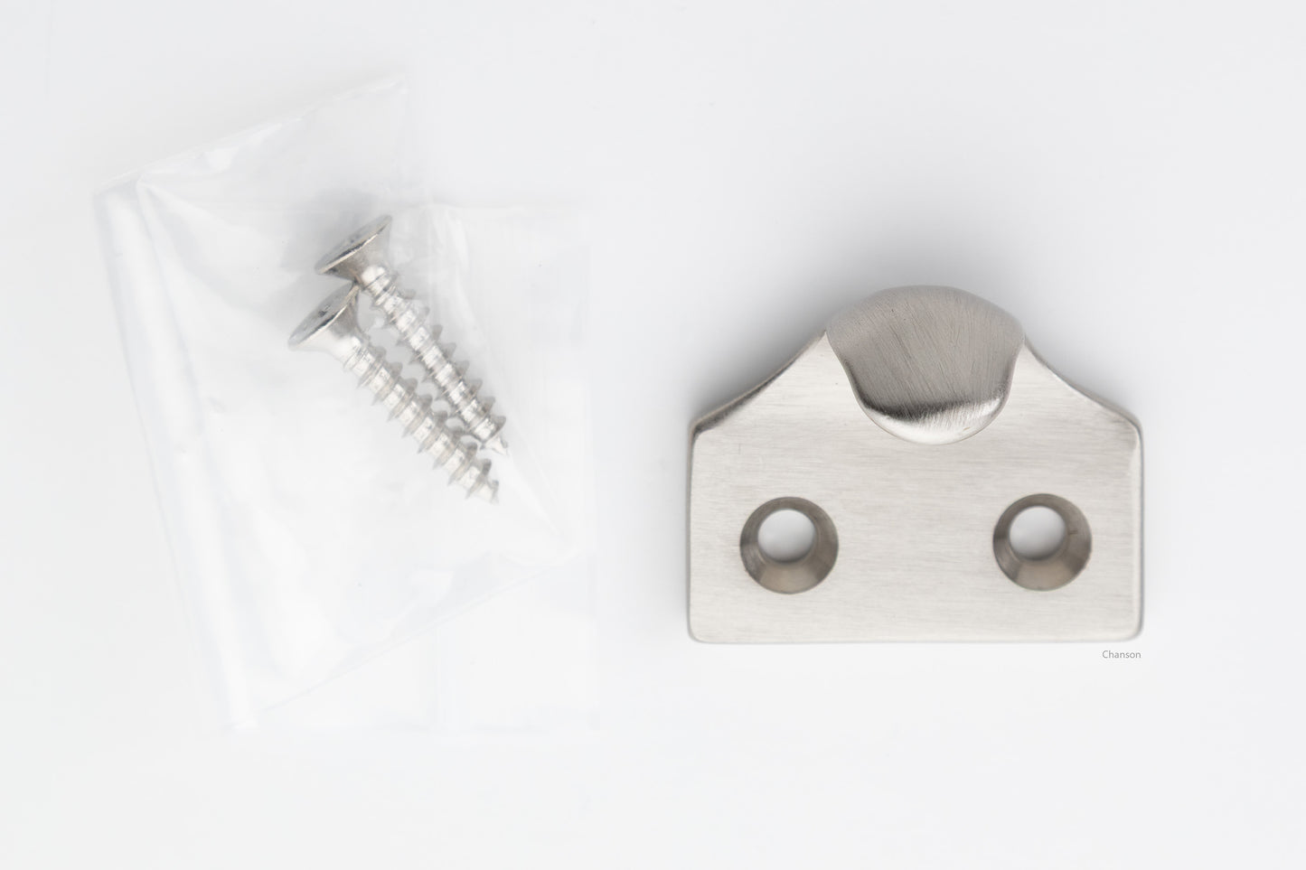 A classic traditional simple solid brass hook type sash window lift in satin or brushed nickel US15 finish, along with finish matching screws