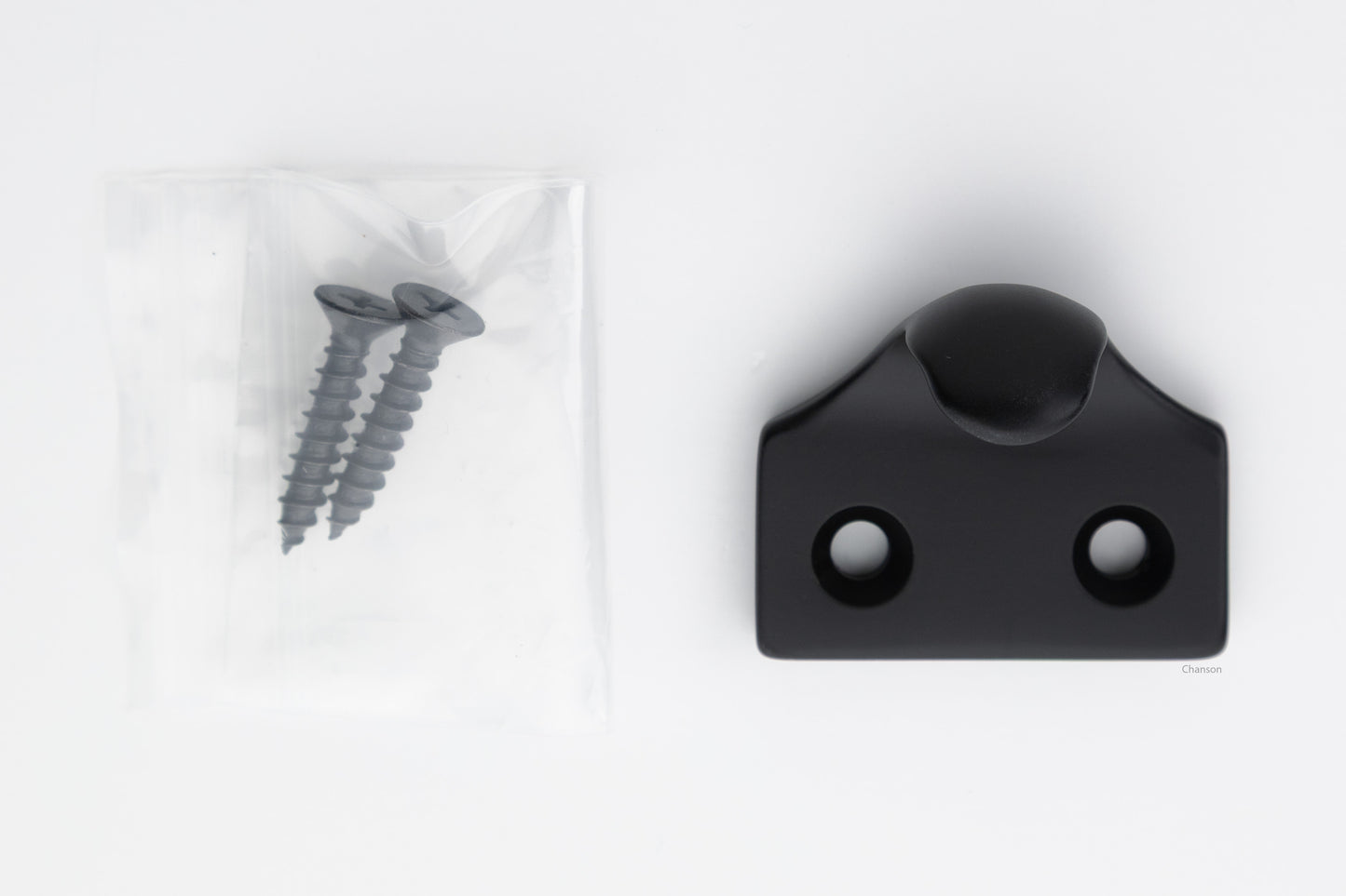 A classic traditional simple solid brass hook type sash window lift in flat or matte black US19 finish, along with finish matching screws