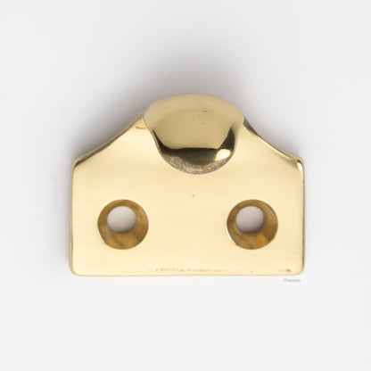 A classic traditional simple solid brass hook type sash window lift in polished brass US3 finish, front view