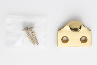 A classic traditional simple solid brass hook type sash window lift in polished brass US3, along with finish matching screws