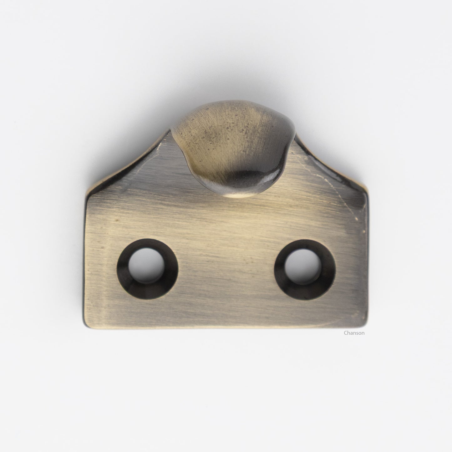 A classic traditional simple solid brass hook type sash window lift in antique brass US5 finish, front view