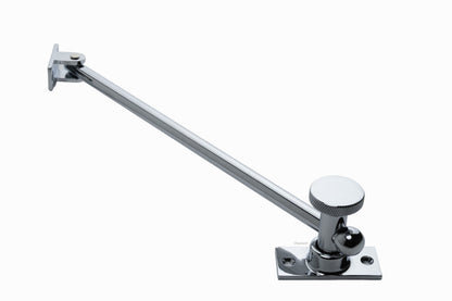 solid brass casement window adjuster or adjustable stay shown at its fully extended position with its 10 inch rod with polished chrome finish US26
